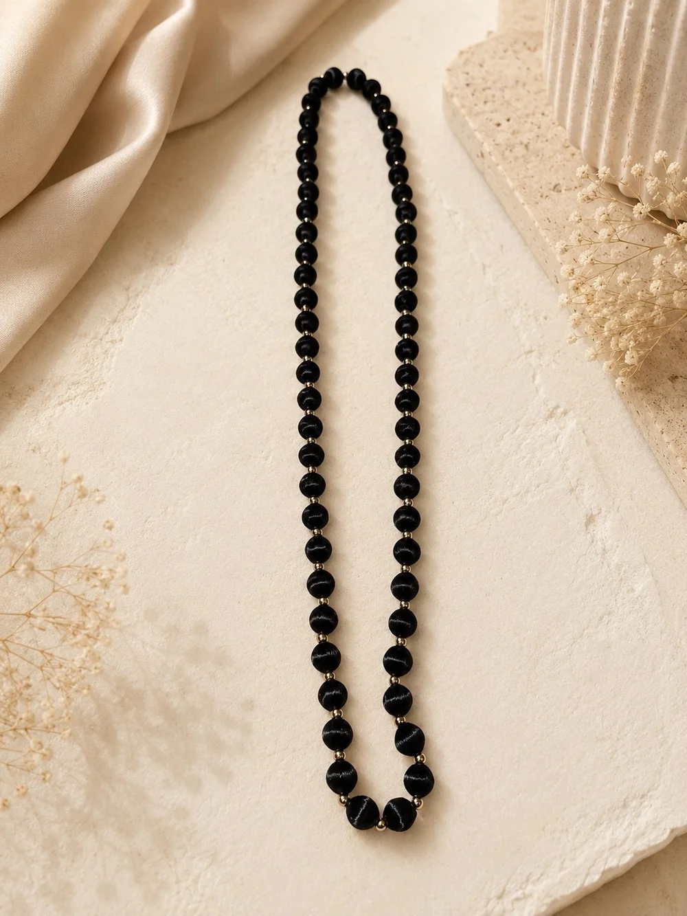 Classic Black Bead Necklace with Gold Accents